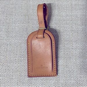 LOUIS VUITTON - VACHETTA LEATHER LUGGAGE TAG.